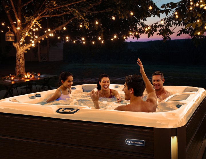 family at a hot tub party